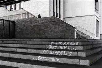 Graffiti on steps below the Franklinbrücke, a road and pedestrian bridge in Düsseldorf-Pempelfort,