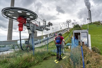 CopenHill, waste incineration plant and artificial ski slope, skiing with a view of the Oresund,