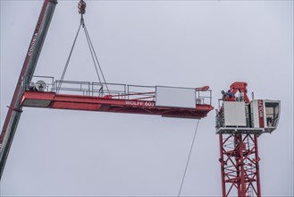 Dismantling of a large construction crane, on a large construction site, housing construction,