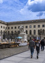 Tourists at the flea market stall in front of Humboldt University, Unter den Linden, Berlin,