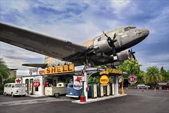 Petrol station and propeller plane