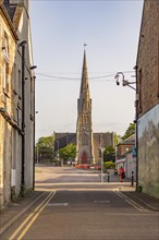 Church of Scotland, Parish Church Invergordon with building facade in front during sunrise,