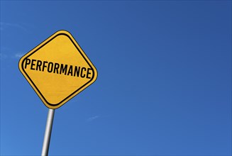 Performance, yellow sign with blue sky