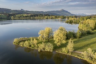 Aerial view over lake Rottachsee towards mountain Grünten, Allgäu, Bavaria, Germany, Europe