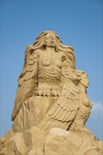 Sirens, sand sculpture in the sky