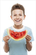 Handsome smiling child boy hand holding red ripe watermelon fruit food slice white isolated