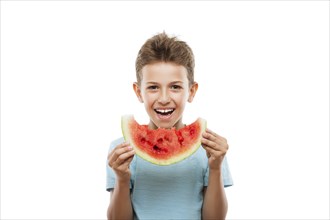 Handsome smiling child boy hand holding red ripe watermelon fruit food slice white isolated