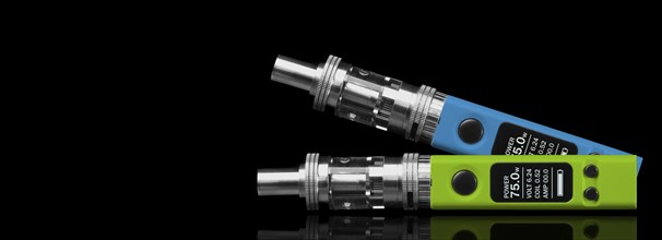 Two electronic cigarettes, isolated on black background