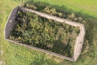 Aerial view of ruins of an old barn near Fürstenberg, Weser River, district of Höxter, Germany,