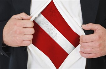 The Latvian flag painted on the chest of a man