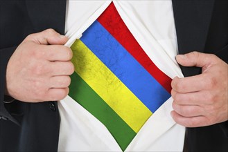 The Mauritius flag painted on the chest of a man