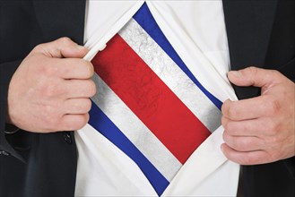 The Costa Rica flag painted on the chest of a man