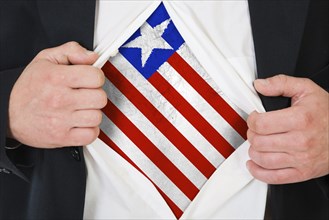 The Liberian flag painted on the chest of a man