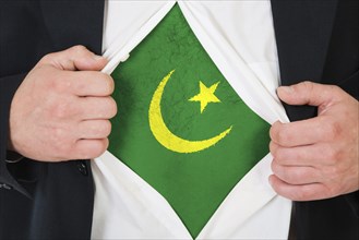 The Mauritania flag painted on the chest of a man