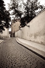 Retro style image of small street in Prague, Czech Republic, Europe