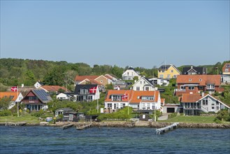 Svendborg, maritime living on the sound, jetty, detached houses, forest, Danish flags Fyn, island