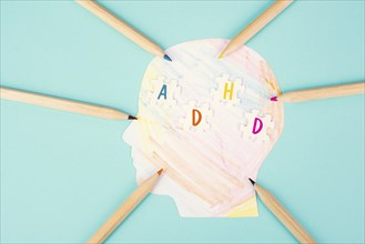 ADHD, attention deficit hyperactivity disorder, mental health, colored paper with pencils