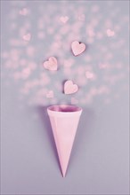 Cone with hearts, birthday and valentines day greeting card, spreading love, positive emotion, flat