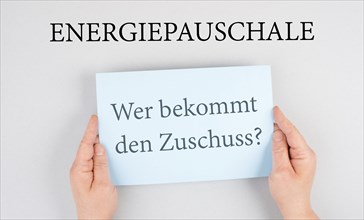 Energy flat rate, who receives the subsidy is standing in german language on the paper, finanical