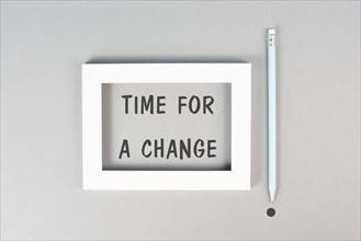 The phrase time for a change is standing in the frame, starting a new business or education goal,