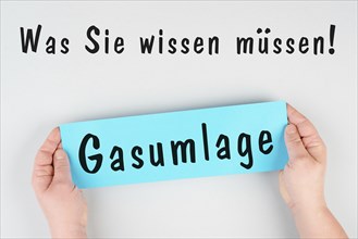 Gas commission is standing in german language on the paper, new fee regualtion in Germany, risk for