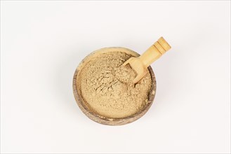 Healing earth powder in a bowl, supplement and antioxidant for to detox the body, alternative