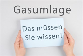 Gas commission is standing in german language on the paper, new fee regualtion in Germany, risk for