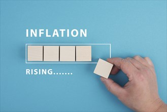 Inflation rising is standing next to the loading bar, high living costs, gas and electricity