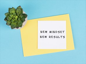 New mindset new results is standing on a paper, coaching strategy, optimistic and positive