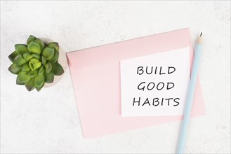 The words build good habits are standing on a paper, change lifestyle, healthy and positive