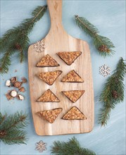 Nut corner, traditional german sweets called Nussecke, covered with chocolate, christmas baking