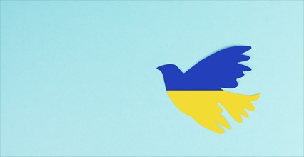 Ove in the colors of the ukrainian flag, symbol for peace and hope, pigeon bird in blue and yellow,