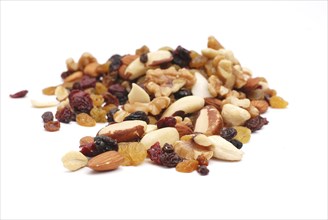 Mixture of nuts, dry fruits, healthy food, white background