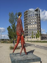 Modern sculpture in front of a modern building in sunny weather, Doesburg, Gelderland, Netherlands