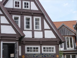 Close-up of a half-timbered house with decorated windows and traditional elements, Detmold, North