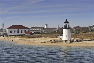 The Brant Point Lighthouse at the entrance to Nantucket Harbor. The 26 foot tall white wooden