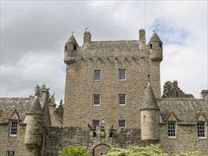 A historic castle with turrets under a cloudy sky, inverness, scotland, Great Britain