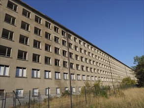 Abandoned multi-storey building with many windows under a blue sky, Binz, Rügen, Germany, Europe