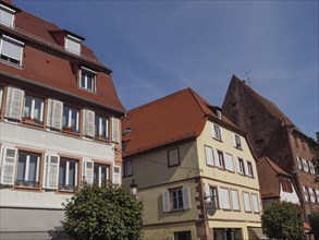 Half-timbered houses and other traditional buildings under a blue sky, Wissembourg, Alsace, France,