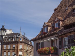 Close-up of traditional houses with steep roofs and many windows, Wissembourg, Alsace, France,