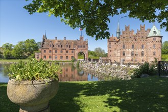 Bridge to Egeskov moated castle with gatehouse, KvÃ¦rndrup near Svenborg, Svendburg, reflection,