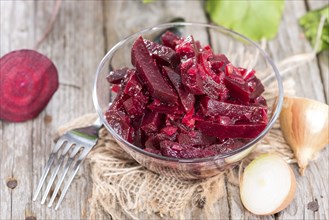 Homemade Beetroot Salad in a small bowl (ready to eat)