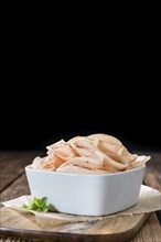 Heap of sliced Chicken Breast Fillet (selective focus, close-up shot)