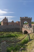 Broholm Castle, Gudme, 14th century, brick building, fortification, water plants, stone wall,