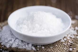 Portion of Coarse Salt on vintage background (selective focus, close-up shot)