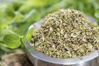 Portion of shredded Oregano (detailed close-up shot)