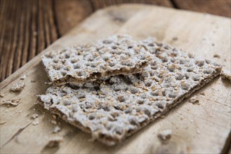 Crispbread (selective focus) on an vintage wooden table