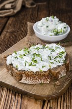 Slice of Bread with Herb Curd (detailed close-up shot)