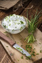 Fresh made Herb Curd (close-up shot) on vintage background