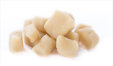 Raw Marzipan (close-up shot) isolated on white background